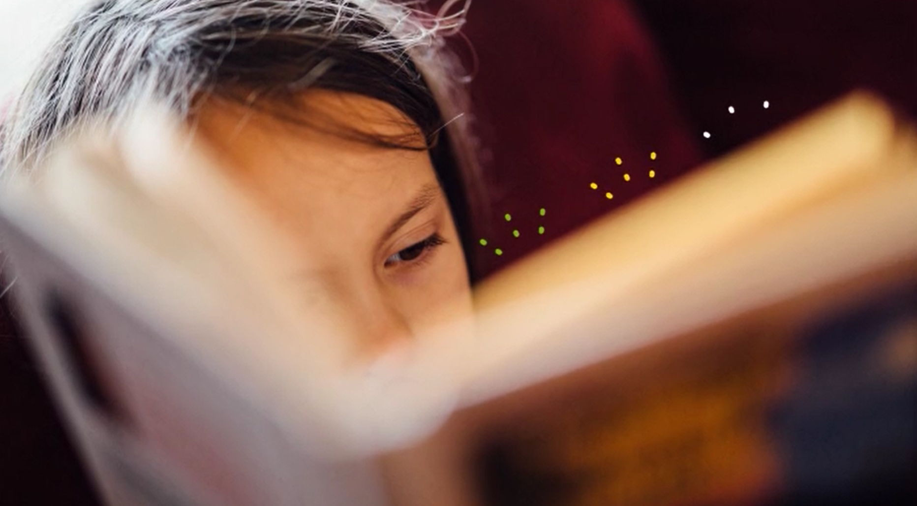 Child reading a book