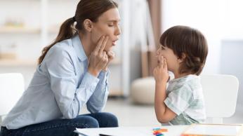 Teacher and student practicing oral language