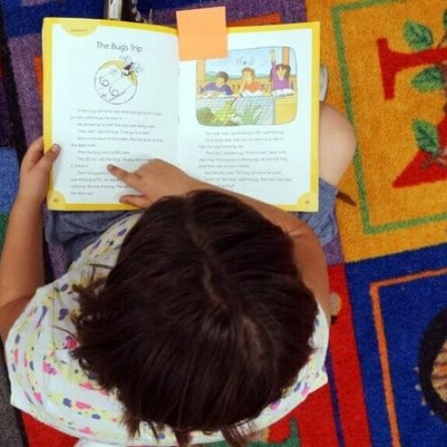 Child reading a book