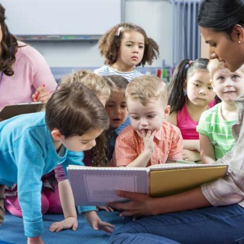 teacher reading to kids