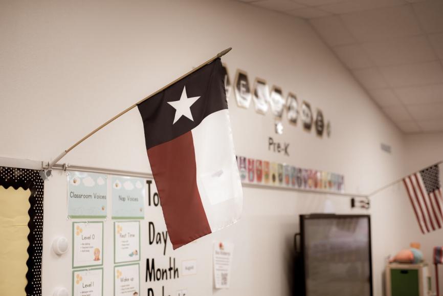 Texas state flag hanging in classroom.